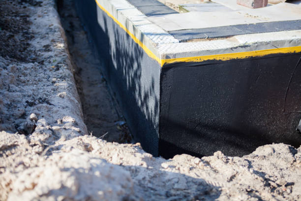 Professional Emergency Waterproofing technician working in Plymouth, MI